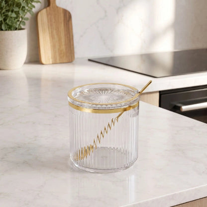 pot a epice vide transparent et or sur un comptoir