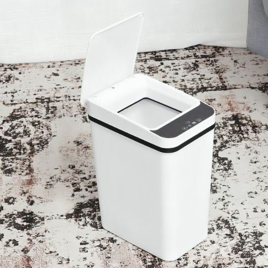 poubelle de cuisine blanche avec couvercle ouvert